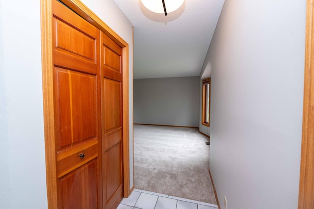 6262 Fernbrook Ln N, Maple Grove, MN 55311 - corridor featuring light carpet and light tile patterned flooring