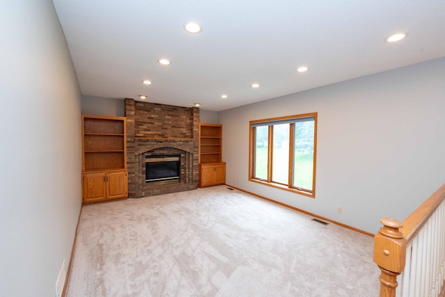 6262 Fernbrook Ln N, Maple Grove, MN 55311 - unfurnished living room featuring recessed lighting, light carpet, and a fireplace