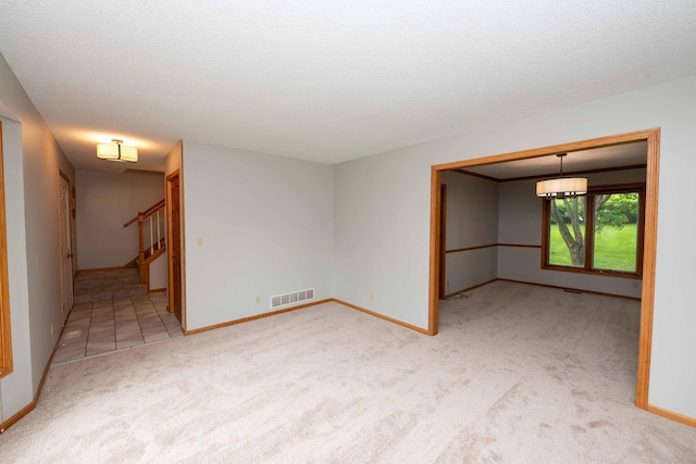 6262 Fernbrook Ln N, Maple Grove, MN 55311 - unfurnished room featuring carpet and stairway