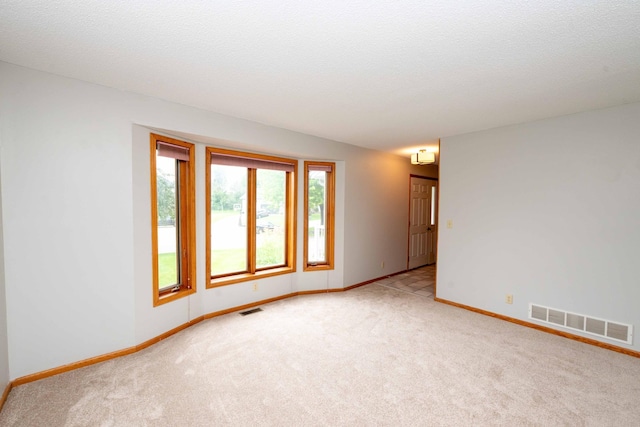 6262 Fernbrook Ln N, Maple Grove, MN 55311 - carpeted empty room featuring baseboards
