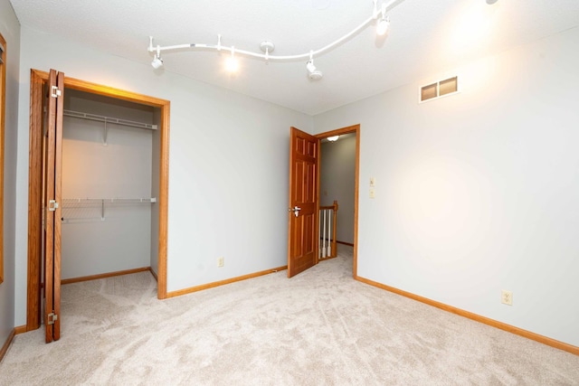 6262 Fernbrook Ln N, Maple Grove, MN 55311 - unfurnished bedroom with carpet floors and a closet
