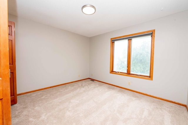 6262 Fernbrook Ln N, Maple Grove, MN 55311 - empty room featuring light carpet and baseboards