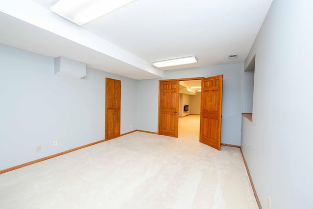 6262 Fernbrook Ln N, Maple Grove, MN 55311 - finished below grade area featuring light colored carpet and baseboards