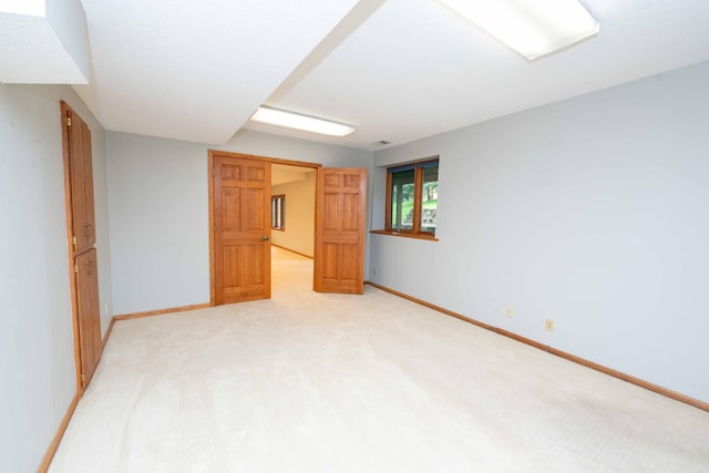 6262 Fernbrook Ln N, Maple Grove, MN 55311 - unfurnished bedroom featuring light carpet and baseboards