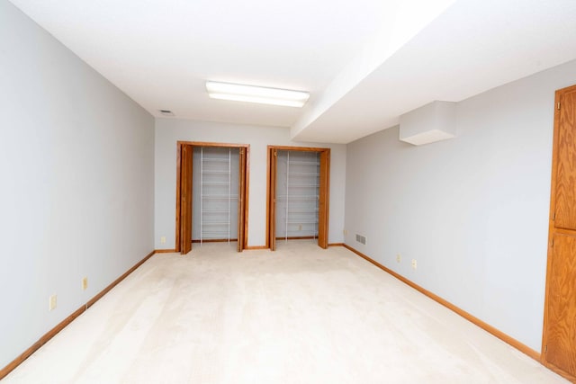 6262 Fernbrook Ln N, Maple Grove, MN 55311 - unfurnished bedroom with multiple closets and light colored carpet