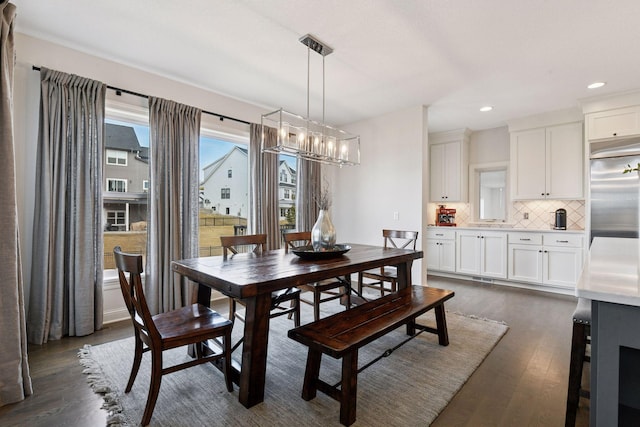 6333 Yuma Ln N, Maple Grove, MN 55311 - dining space with dark wood finished floors, recessed lighting, and a chandelier