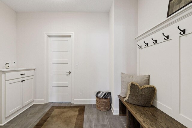 6333 Yuma Ln N, Maple Grove, MN 55311 - mudroom with dark wood-style floors and baseboards
