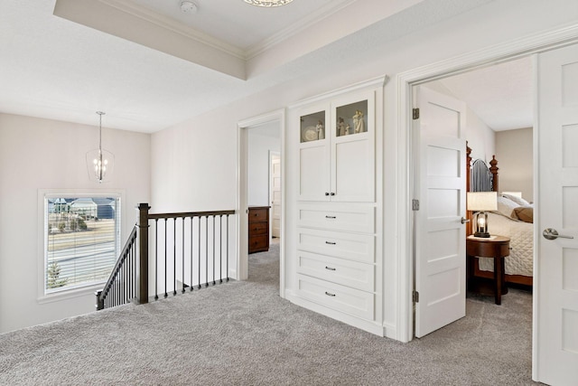 6333 Yuma Ln N, Maple Grove, MN 55311 - hall featuring light colored carpet, a chandelier, an upstairs landing, and crown molding