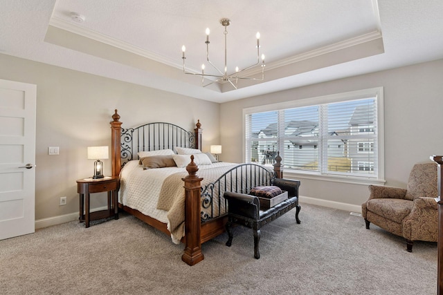6333 Yuma Ln N, Maple Grove, MN 55311 - bedroom with a raised ceiling, ornamental molding, a chandelier, and light carpet