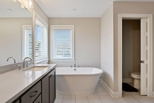6333 Yuma Ln N, Maple Grove, MN 55311 - full bath featuring a soaking tub, vanity, and tile patterned floors
