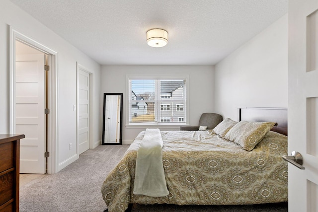 6333 Yuma Ln N, Maple Grove, MN 55311 - carpeted bedroom featuring baseboards and a textured ceiling