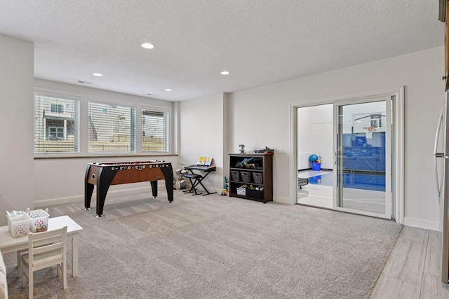 6333 Yuma Ln N, Maple Grove, MN 55311 - playroom featuring a textured ceiling and recessed lighting