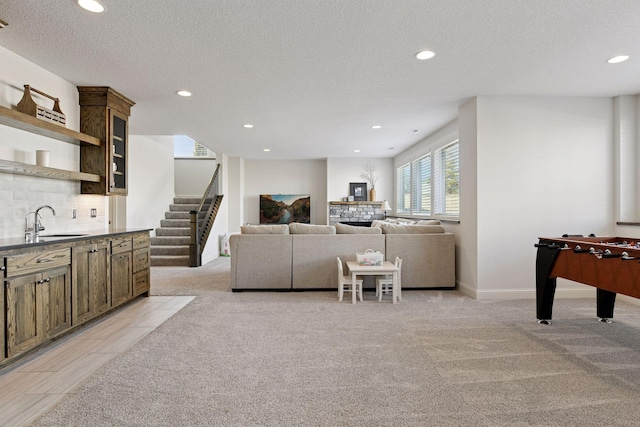 6333 Yuma Ln N, Maple Grove, MN 55311 - living room with recessed lighting, stairway, light carpet, and a textured ceiling