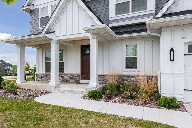 6333 Yuma Ln N, Maple Grove, MN 55311 - view of exterior entry with covered porch and board and batten siding