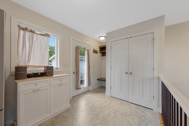 511 9th Ave SW, Faribault, MN 55021 - kitchen featuring white cabinetry and light countertops