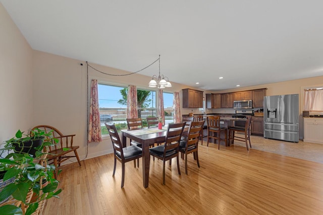 511 9th Ave SW, Faribault, MN 55021 - dining room featuring light wood finished floors, recessed lighting, and a chandelier
