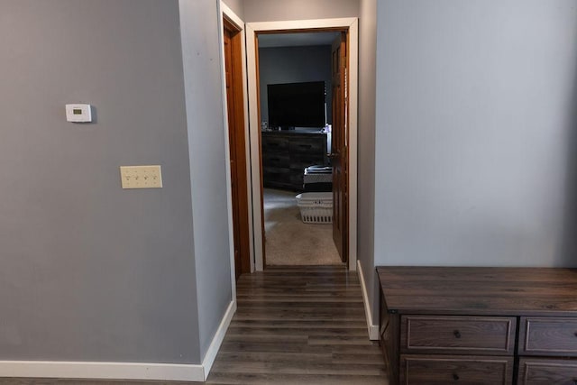 508 Jackson St SW, Hutchinson, MN 55350 - hallway with dark wood-style flooring and baseboards