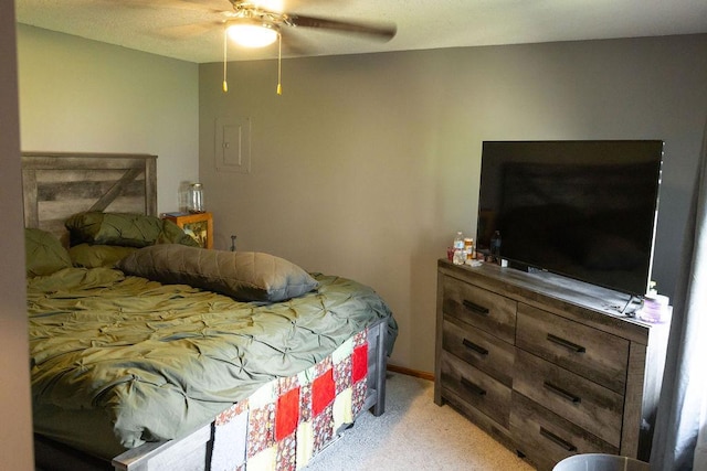 508 Jackson St SW, Hutchinson, MN 55350 - bedroom featuring light carpet, a ceiling fan, and electric panel