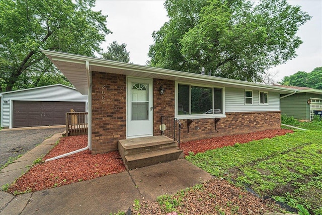 3667 205th St W, Farmington, MN 55024 - single story home featuring brick siding, a detached garage, and an outdoor structure