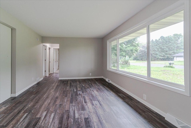 3667 205th St W, Farmington, MN 55024 - spare room with dark wood-type flooring and baseboards