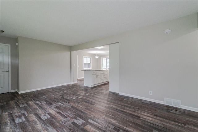 3667 205th St W, Farmington, MN 55024 - unfurnished living room with dark wood finished floors and baseboards