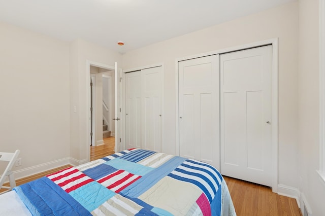 4236 22nd Ave S, Minneapolis, MN 55407 - bedroom with two closets and light wood finished floors