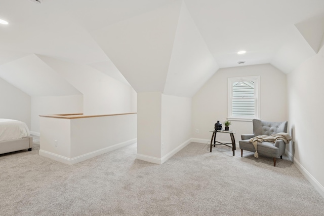 4236 22nd Ave S, Minneapolis, MN 55407 - living area with carpet flooring, lofted ceiling, and recessed lighting