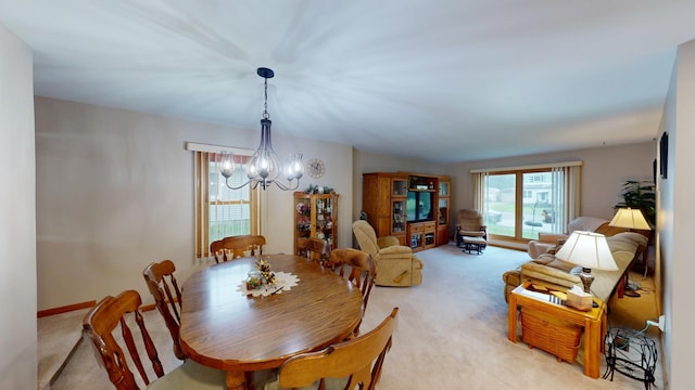 216 1st St, Kiester, MN 56051 - dining room with a chandelier and light carpet