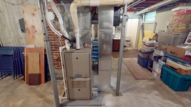 216 1st St, Kiester, MN 56051 - utility room featuring heating unit