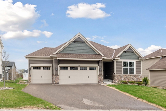 5743 Meridian Way NE, Prior Lake, MN 55372 - craftsman inspired home featuring stone siding, a garage, driveway, and a front yard