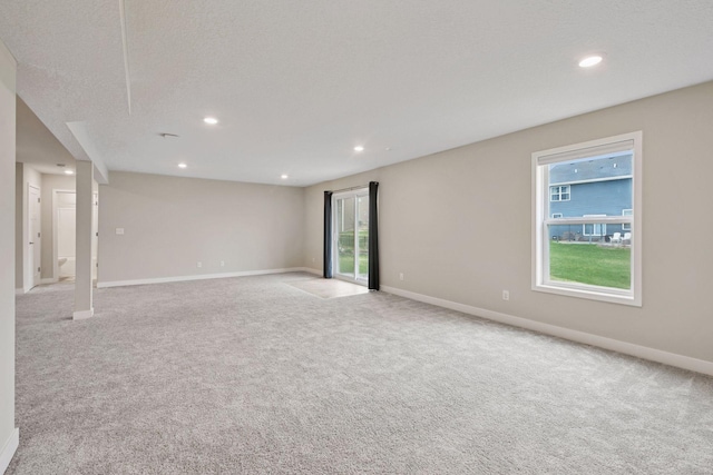 5743 Meridian Way NE, Prior Lake, MN 55372 - carpeted empty room featuring baseboards and recessed lighting