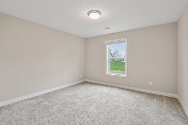 5743 Meridian Way NE, Prior Lake, MN 55372 - carpeted spare room with a textured ceiling and a smoke detector