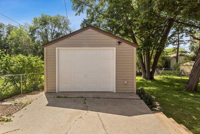 422 Jefferson Ave S, Edina, MN 55343 - detached garage featuring concrete driveway