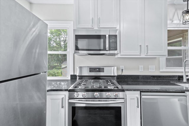 422 Jefferson Ave S, Edina, MN 55343 - kitchen featuring appliances with stainless steel finishes and white cabinets