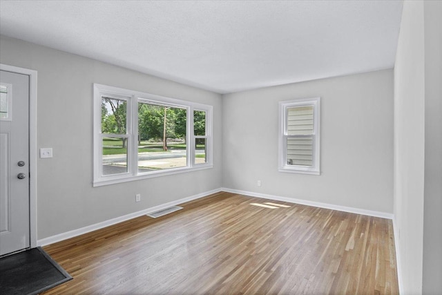 422 Jefferson Ave S, Edina, MN 55343 - unfurnished room with wood finished floors