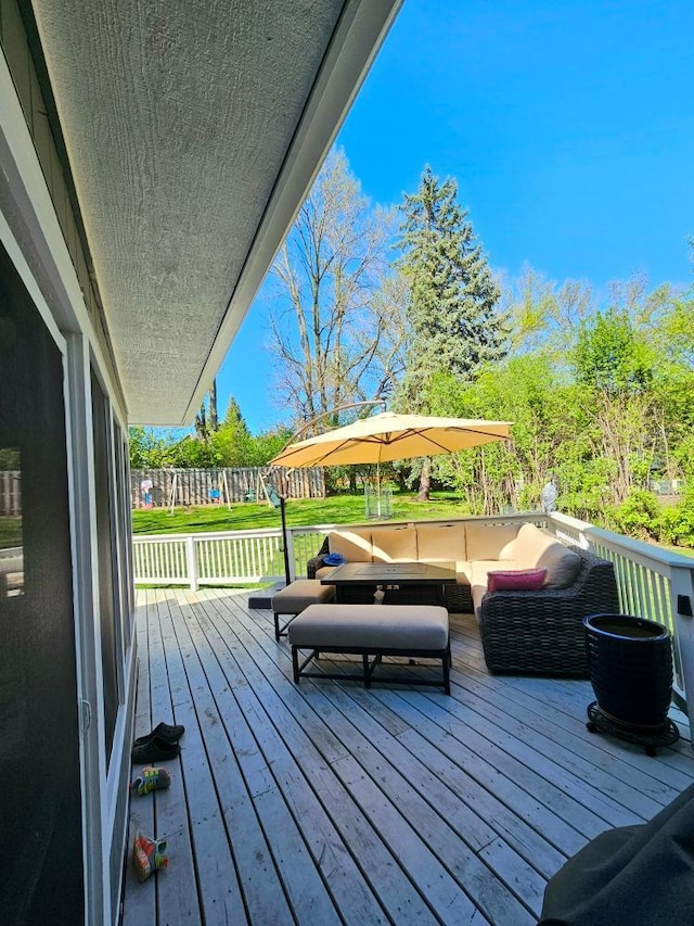 904 155th St, Burnsville, MN 55306 - wooden terrace with an outdoor living space