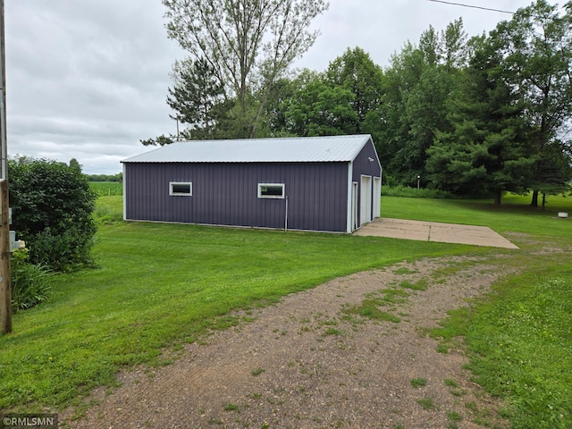 1264 389th Ave NE, Stanchfield Twp, MN 55080 - view of outbuilding with dirt driveway