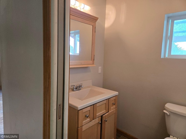 1264 389th Ave NE, Stanchfield Twp, MN 55080 - bathroom with vanity and toilet