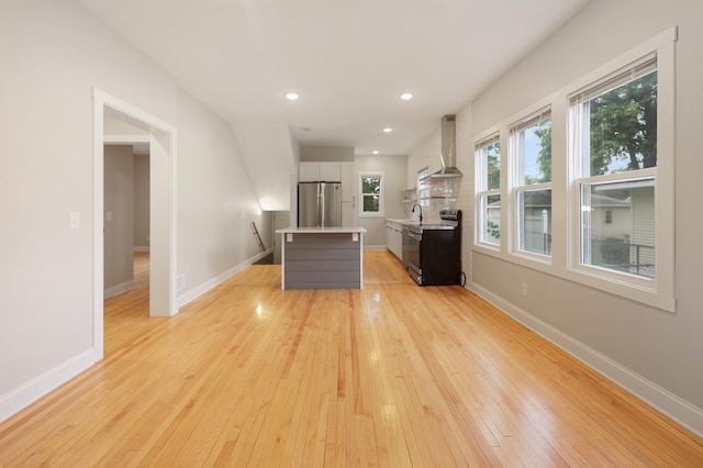 730 13th Ave S, Saint Cloud, MN 56301 - living room with light wood finished floors and recessed lighting