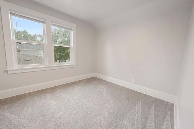 730 13th Ave S, Saint Cloud, MN 56301 - carpeted spare room with baseboards and vaulted ceiling