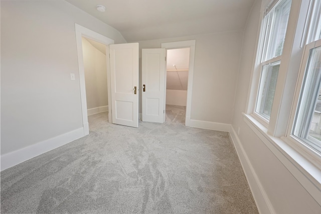 730 13th Ave S, Saint Cloud, MN 56301 - empty room with light colored carpet and a smoke detector