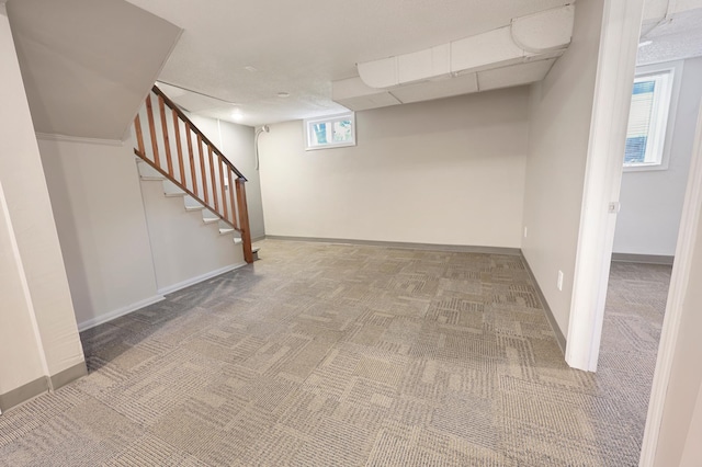 730 13th Ave S, Saint Cloud, MN 56301 - basement featuring carpet floors and stairs