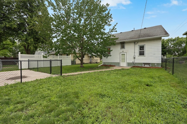 730 13th Ave S, Saint Cloud, MN 56301 - rear view of house with a fenced backyard