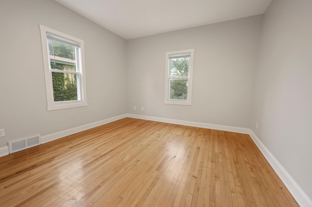 730 13th Ave S, Saint Cloud, MN 56301 - spare room with light wood finished floors and baseboards