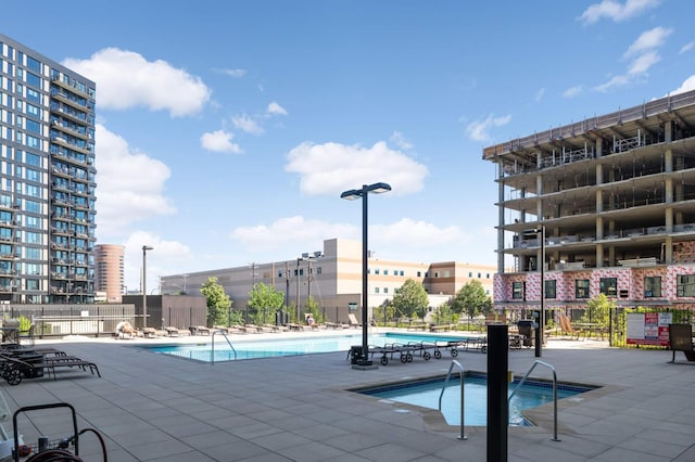 1120 2nd St Unit 1002, Minneapolis, MN 55415 - community pool featuring a patio and a hot tub