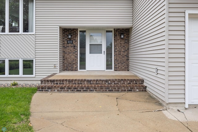 611 4th St NE, Dilworth, MN 56529 - property entrance with brick siding
