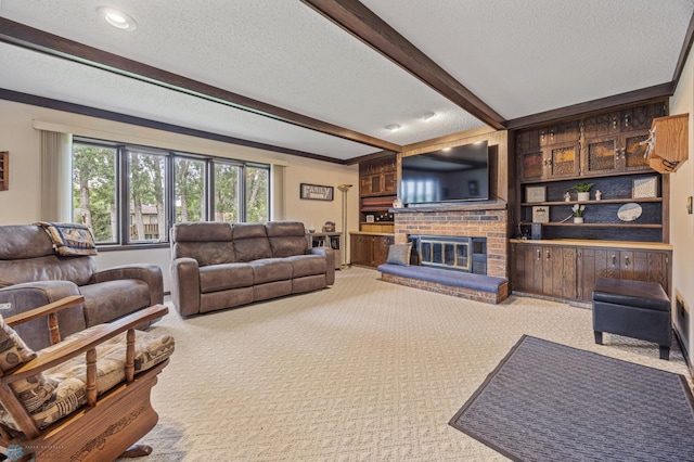 611 4th St NE, Dilworth, MN 56529 - carpeted living room featuring beamed ceiling, a textured ceiling, a brick fireplace, and recessed lighting