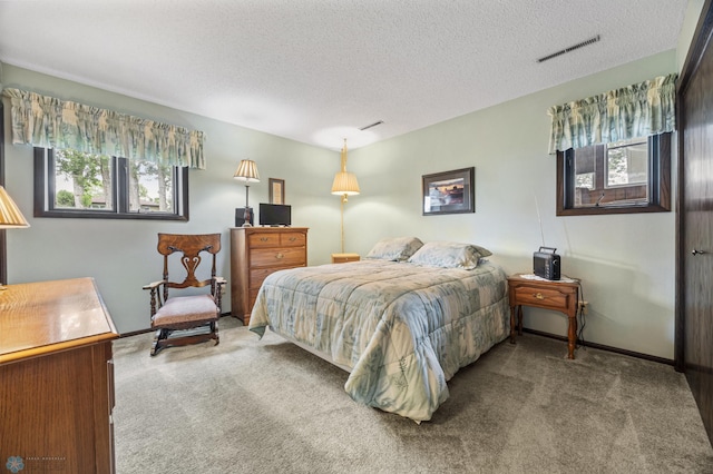 611 4th St NE, Dilworth, MN 56529 - bedroom featuring carpet floors and a textured ceiling