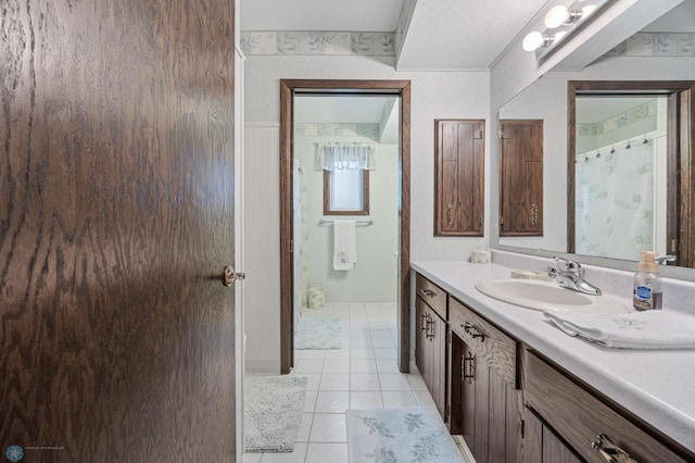 611 4th St NE, Dilworth, MN 56529 - full bathroom featuring vanity and tile patterned floors