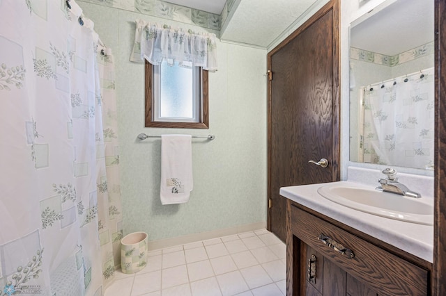 611 4th St NE, Dilworth, MN 56529 - full bathroom with vanity, tile patterned flooring, and a shower with shower curtain